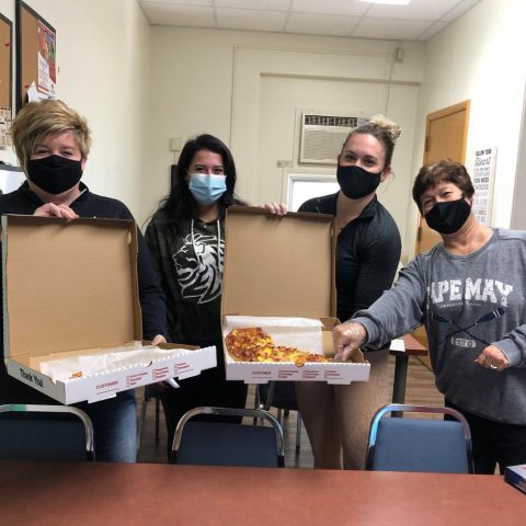 Teachers enjoy pizza purchased by Lions