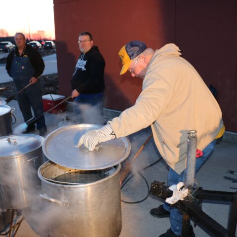Norwalk Lions heat the pots for cooking shrimp and live lobster.